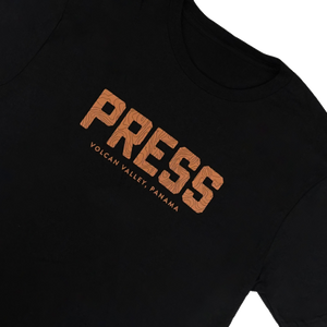 Black sweatshirt with 'PRESS' and 'Volcan Vallely Panama' text in orange on a white background
