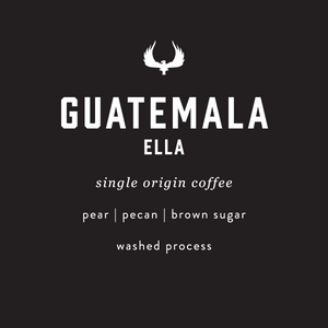 A dark charcoal label with white text reading 'GUATEMALA ELLA' and smaller text below: 'single origin coffee', 'pear | pecan | brown sugar', and 'washed process'. A white bird logo appears above the product name.